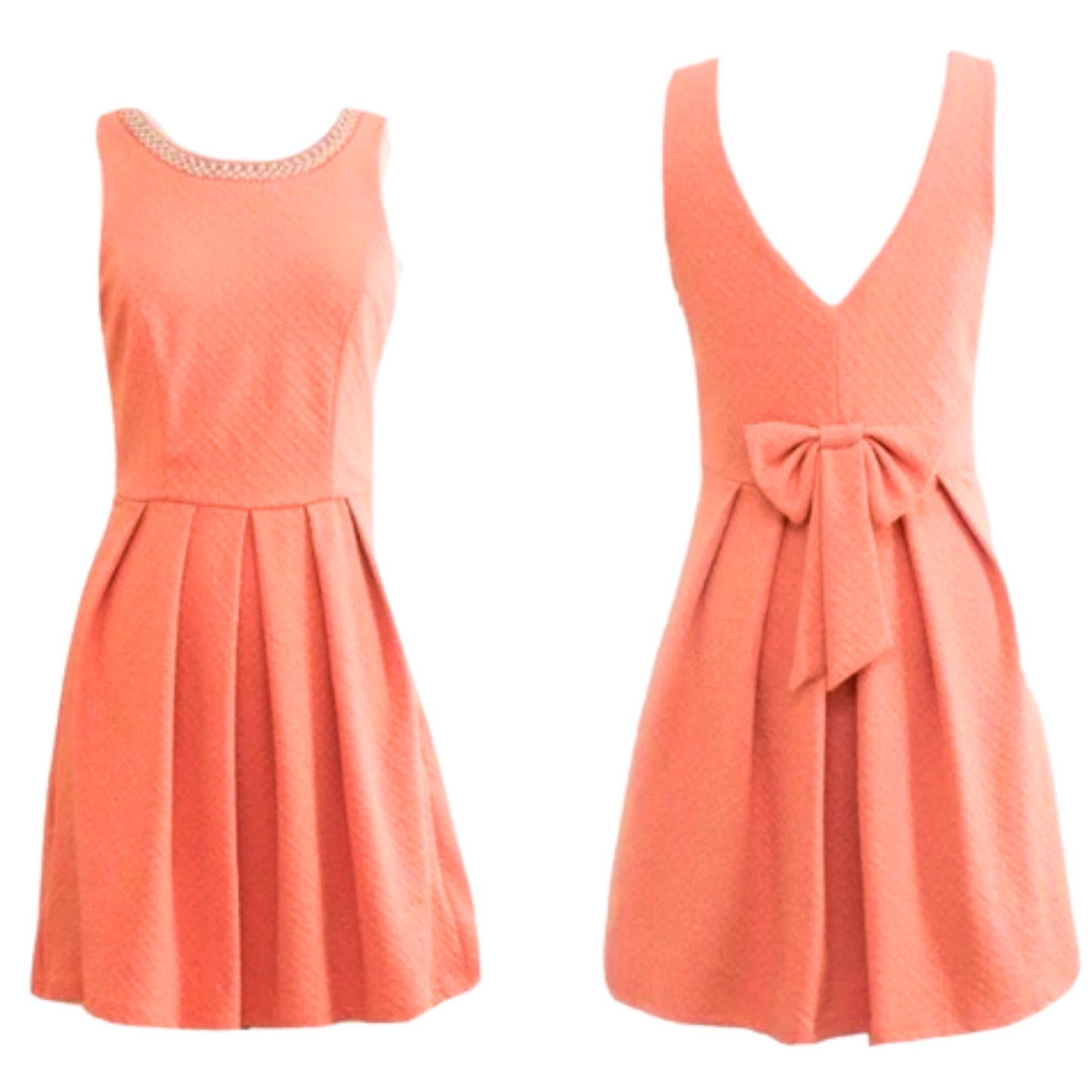 Two coral dresses on a white background
