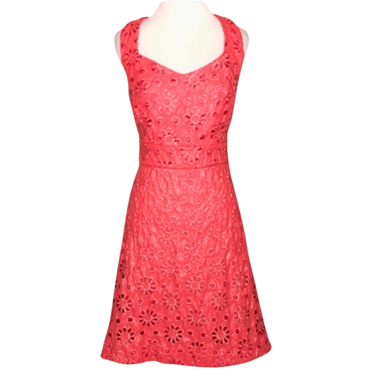 Red lace dress on a mannequin against a transparent background