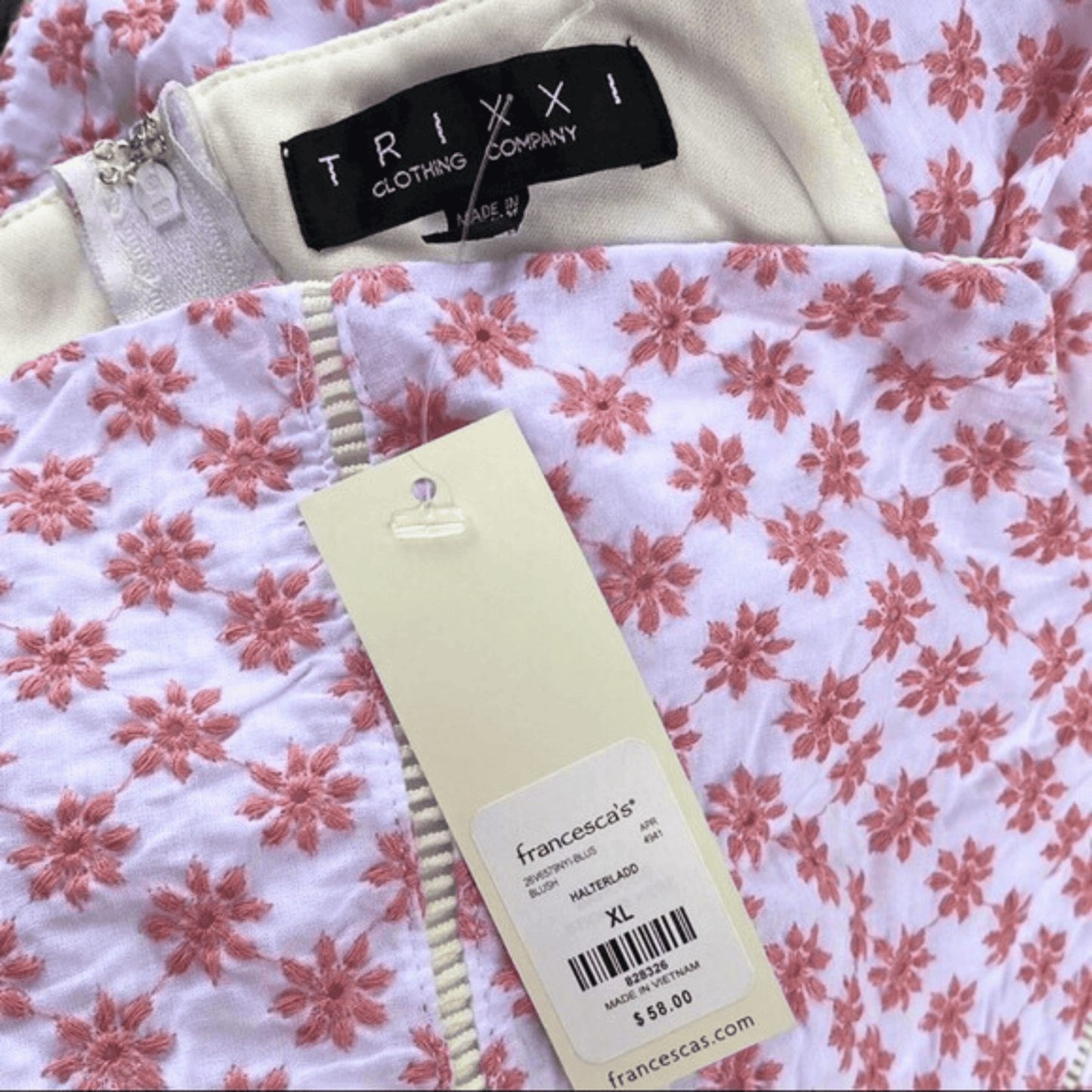 Floral fabric with Trixxi and Francesca's clothing tags.