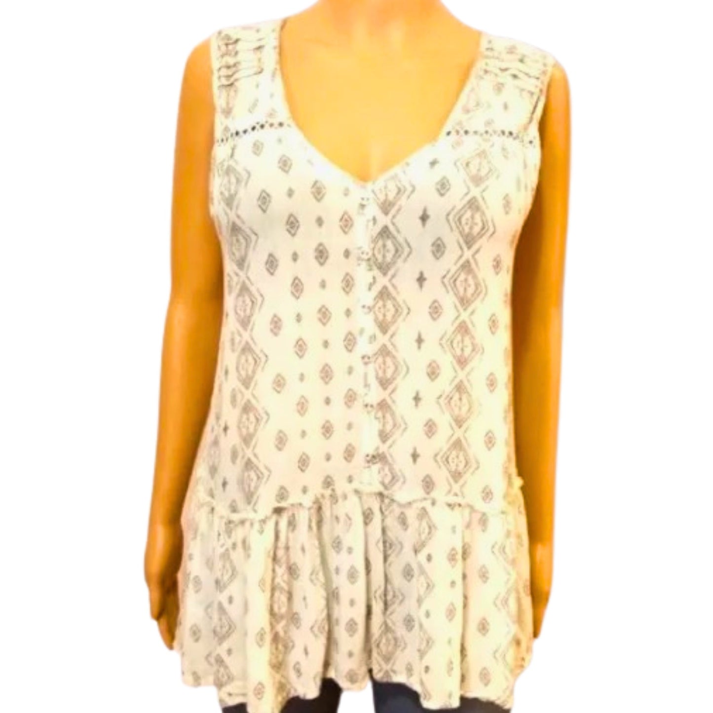 Beige sleeveless top with pattern on a mannequin against a white background