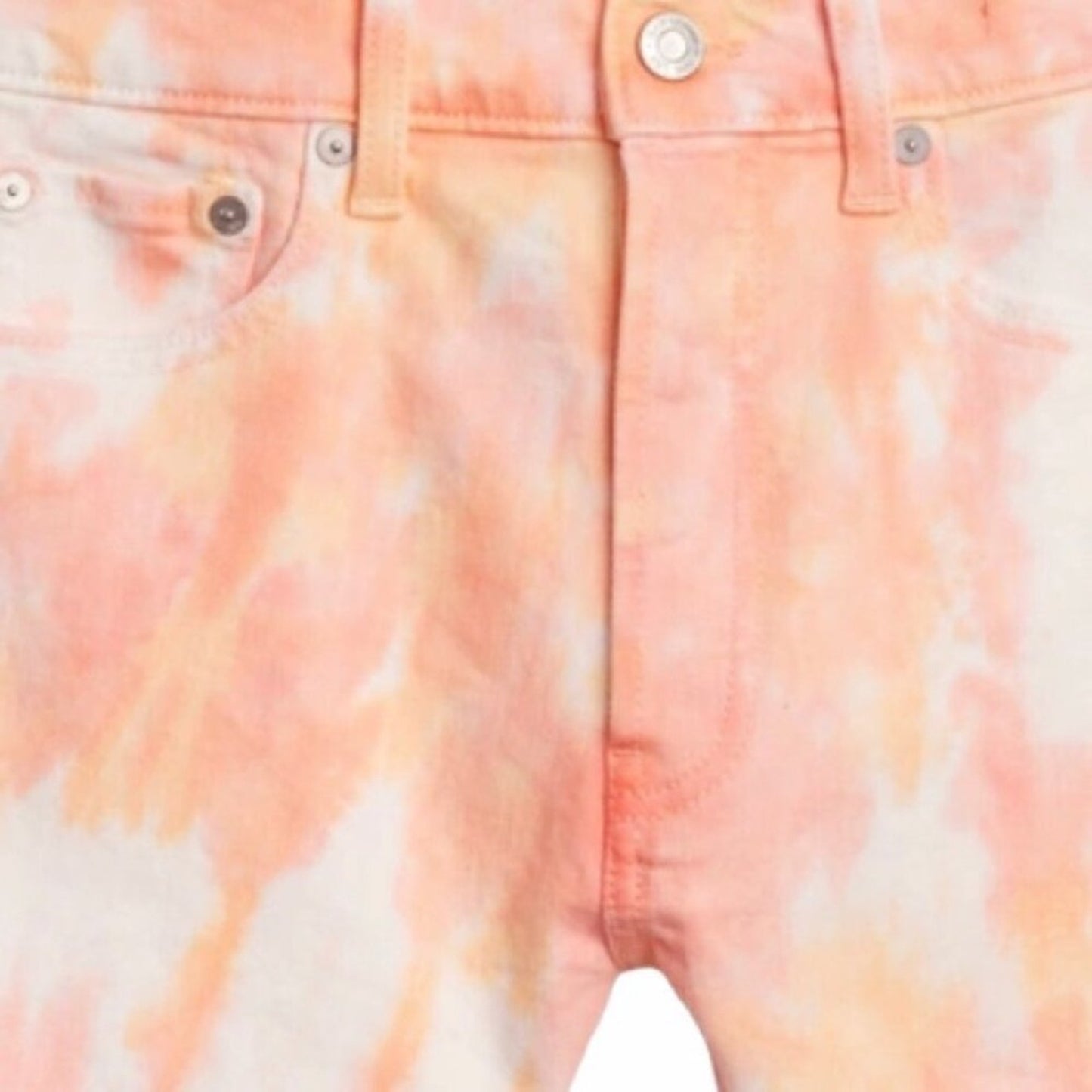 Close-up of a tie-dye shirt with orange and white pattern