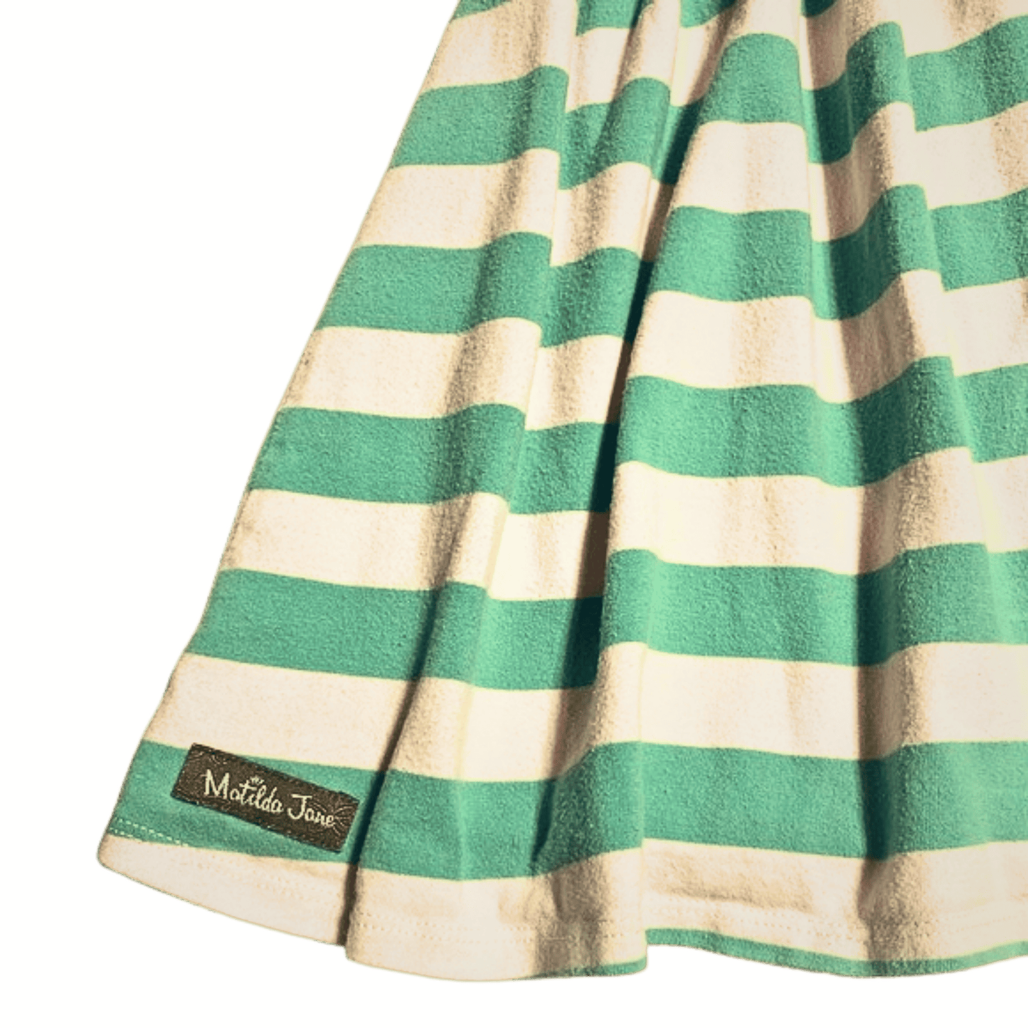 Green and white striped fabric with a brand label on a yellow background