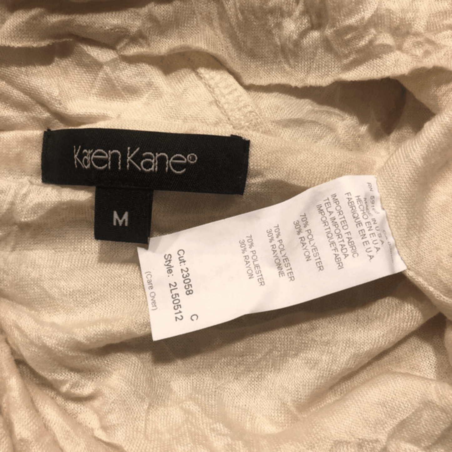 Karen Kane label on a garment with a visible tag