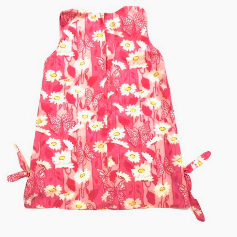 Floral dress with pink background on a white background