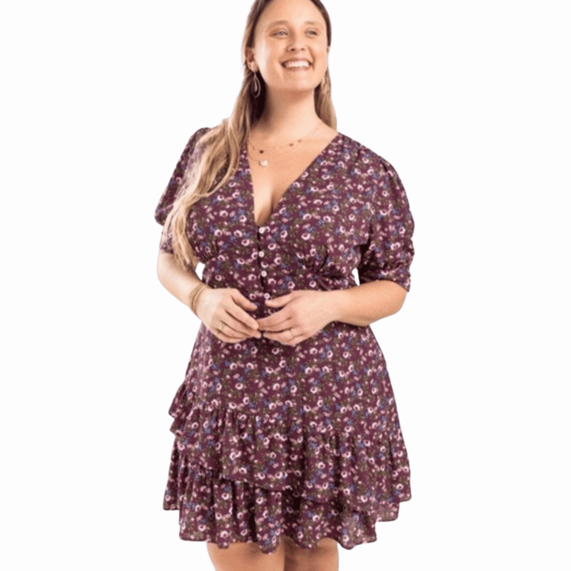 Woman wearing a floral dress against a red background