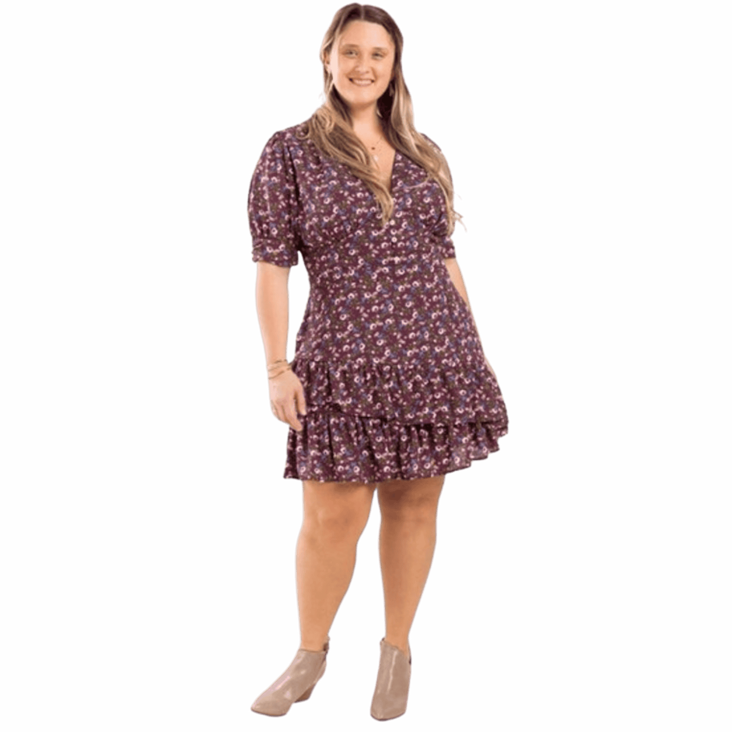 Woman wearing a floral dress on a blue background