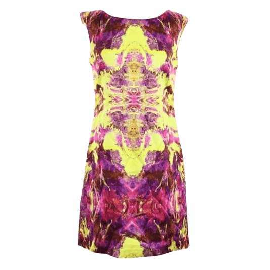 Colorful dress with a pattern on a green background