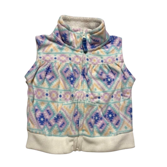 Pastel patterned vest on a white background