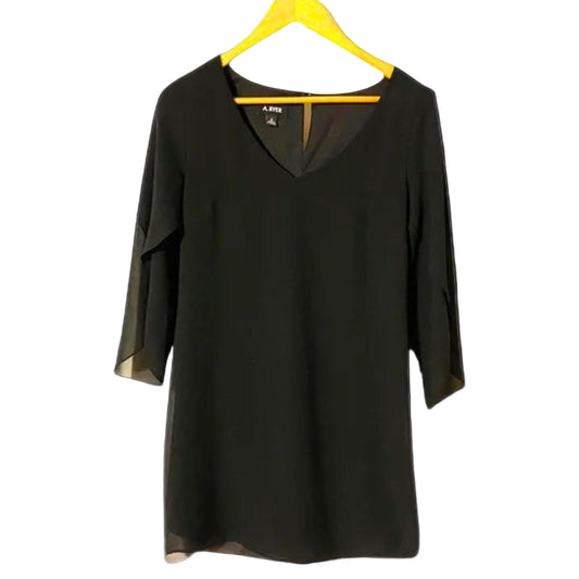 Black dress on a yellow hanger against a white background