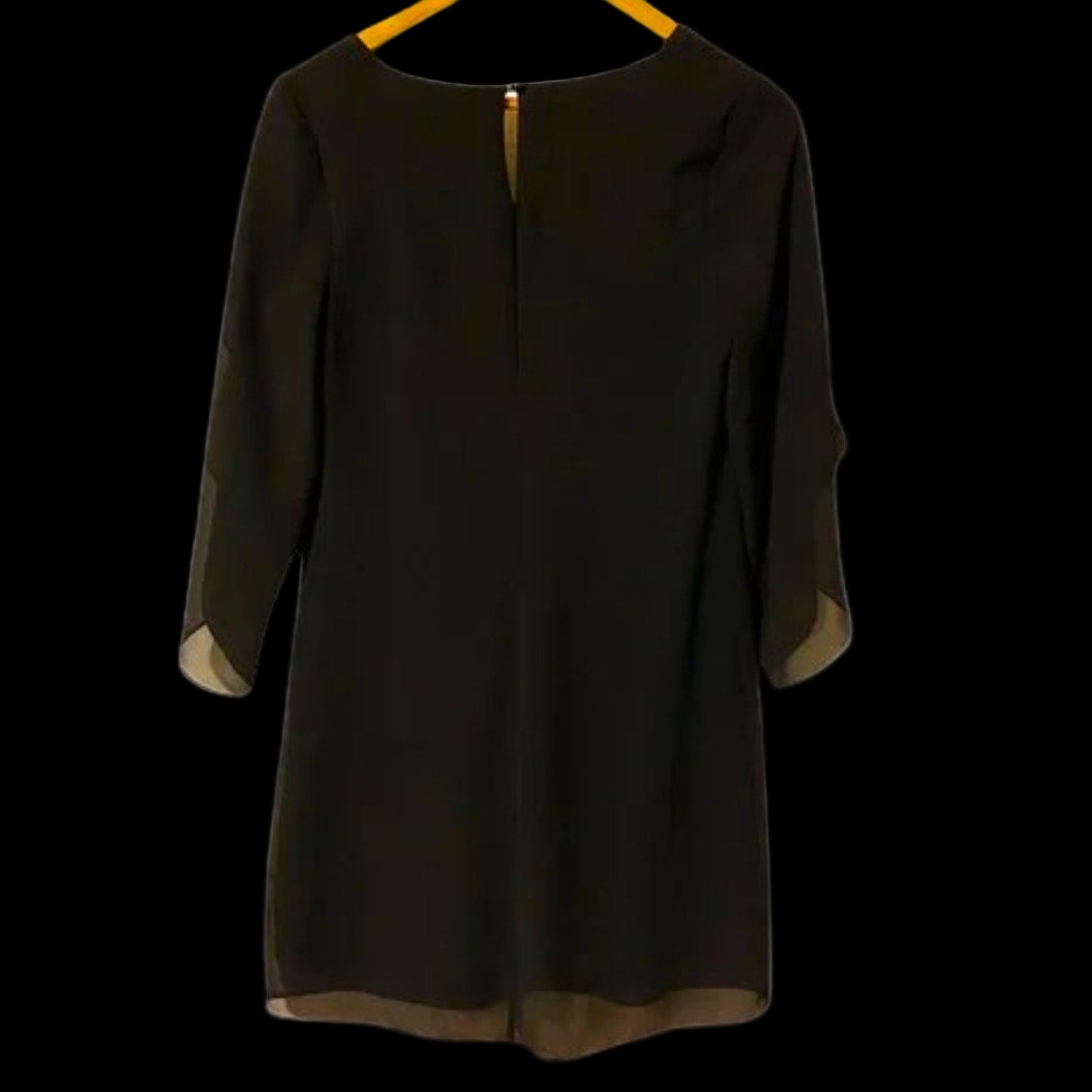 Black dress with sheer sleeves on a white background