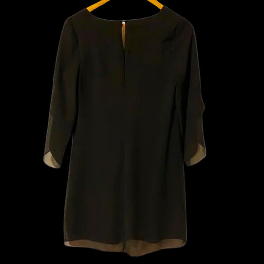 Black dress with sheer sleeves on a white background