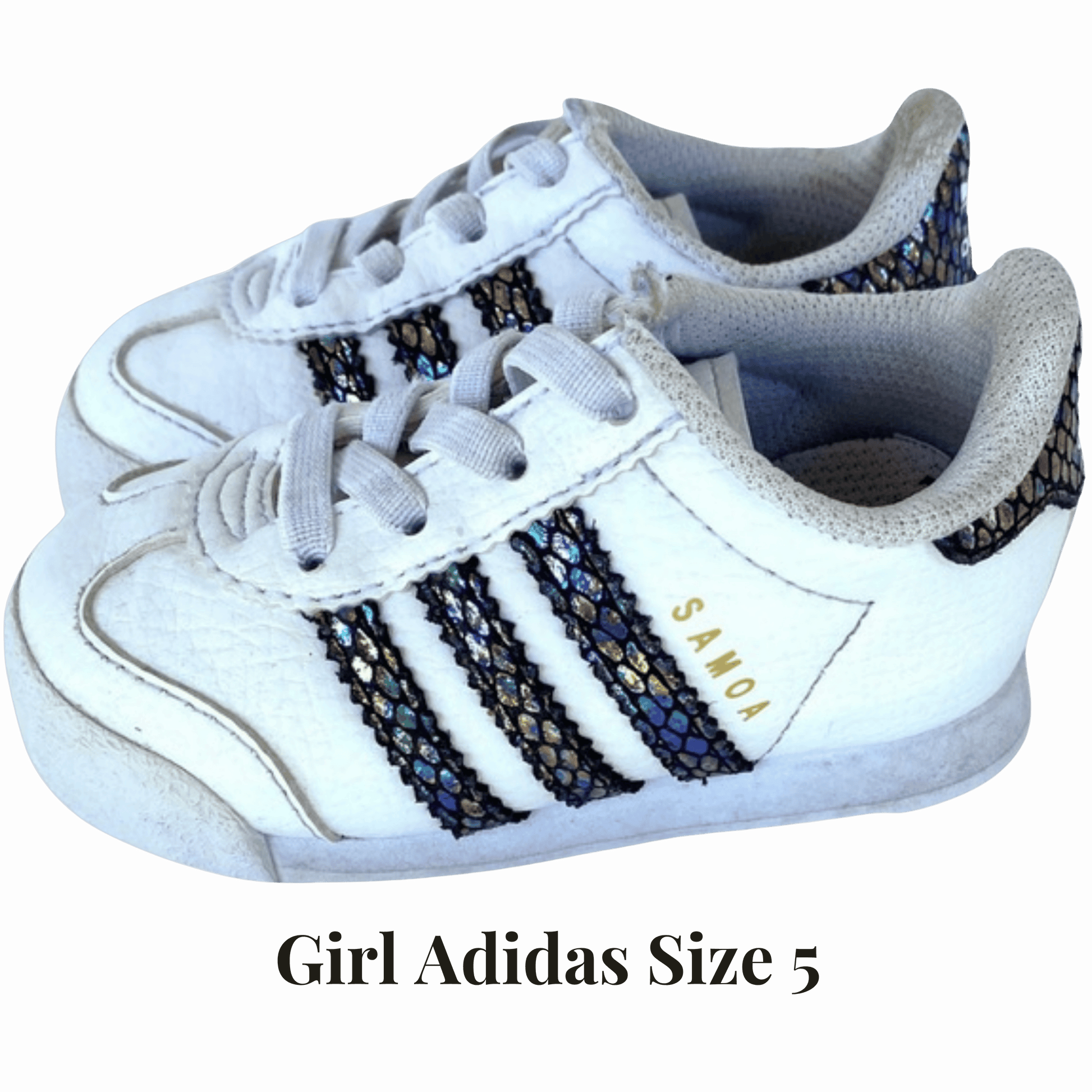 White sneakers with decorative stripes and 'Samo' branding on a beige background