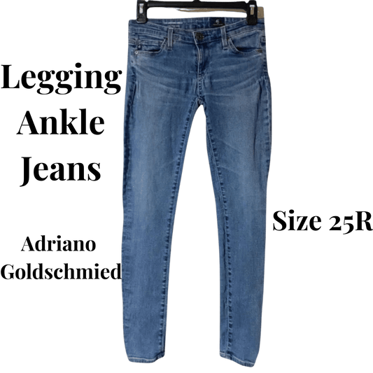 Blue ankle jeans on a hanger with text indicating brand and size.