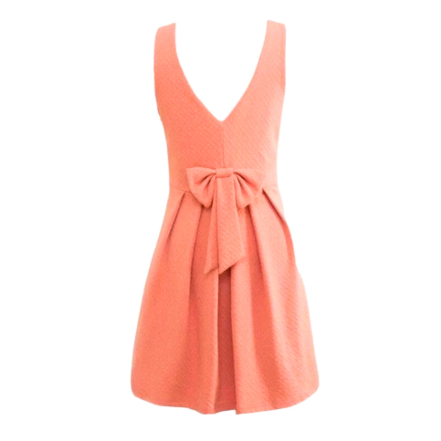 Coral dress with a bow detail on a white background