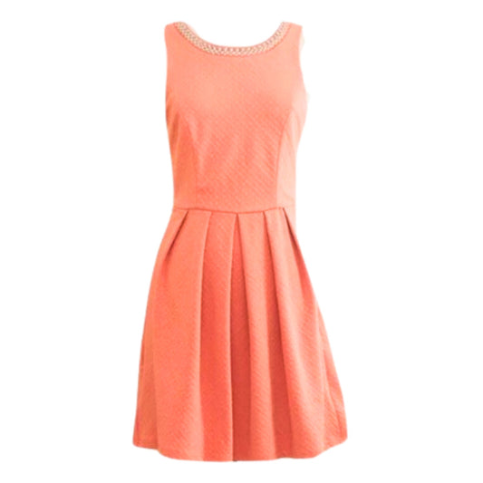 Coral dress with lace neckline on a white background