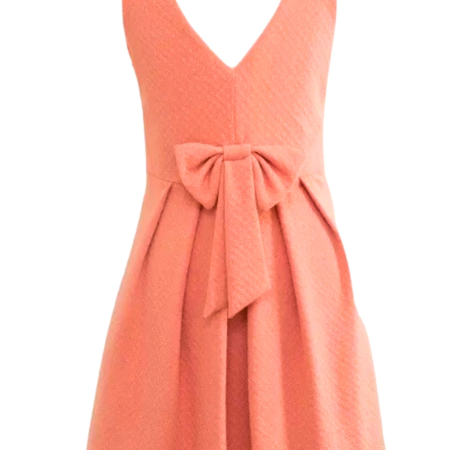 Coral dress with a bow detail on a white background