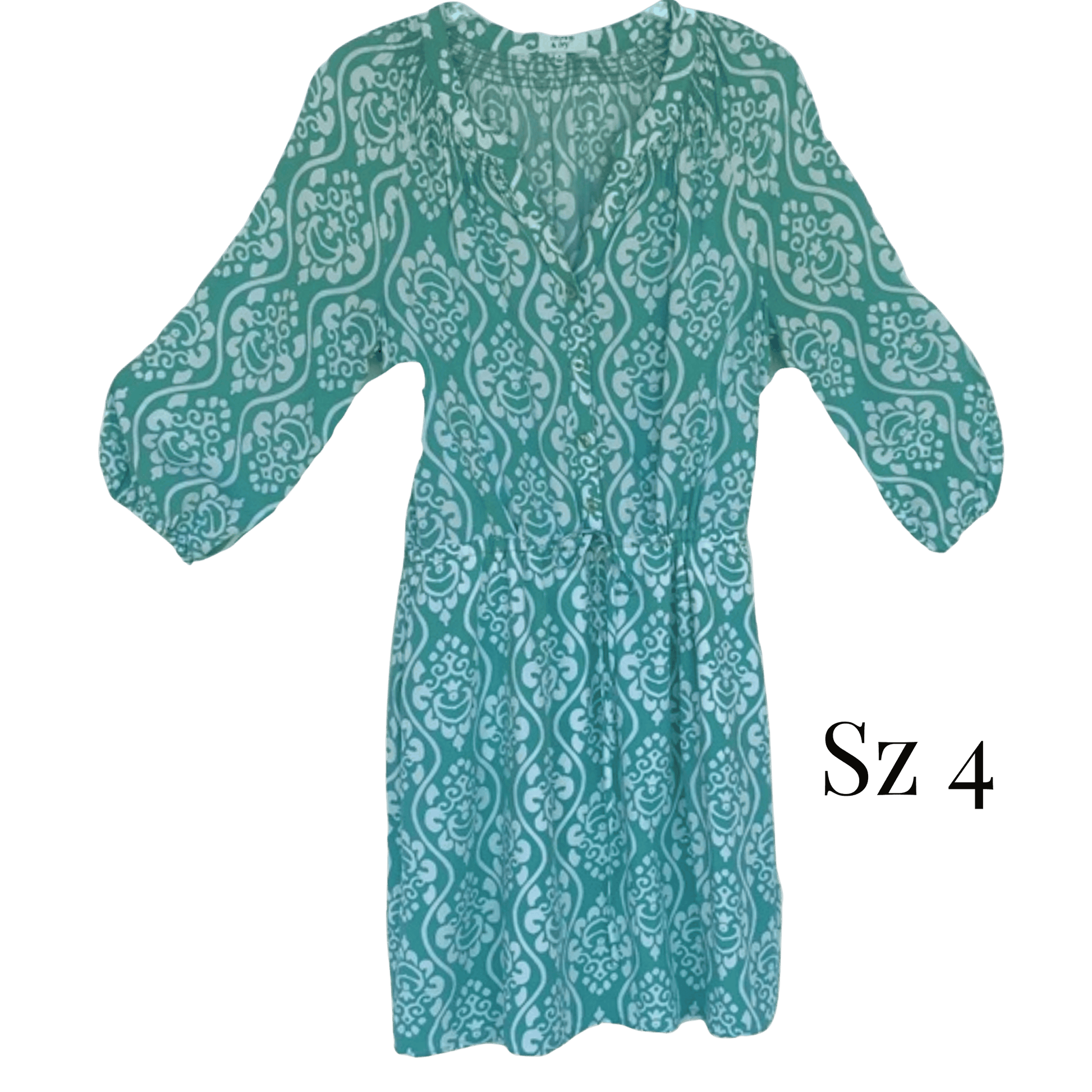 Teal patterned dress with 'Sz 4' label on a green background