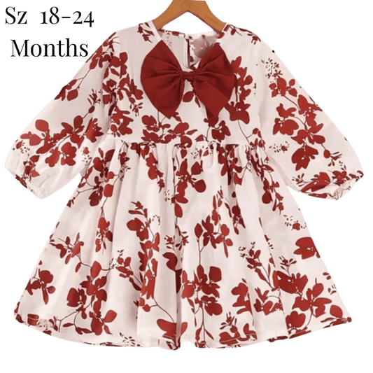 Floral dress with a red bow on a hanger, size 18-24 months
