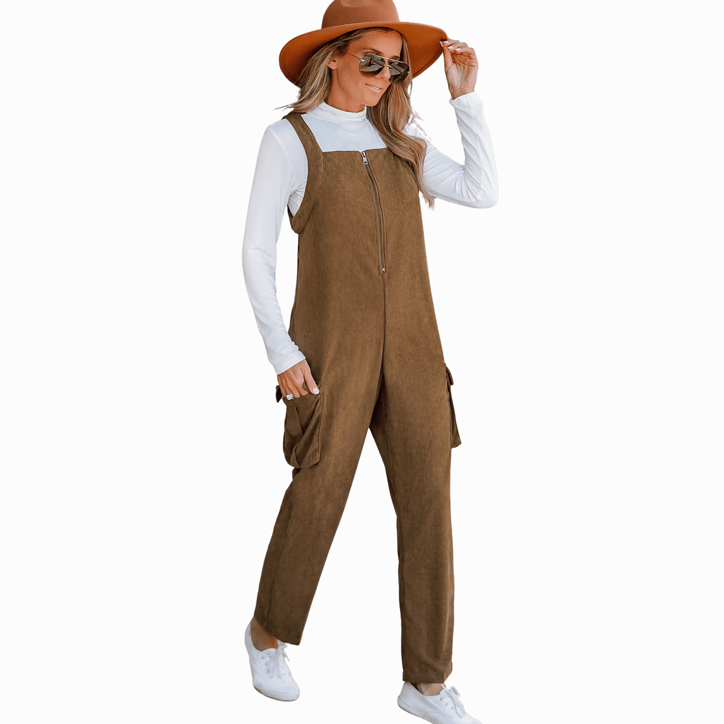 Woman wearing a brown overalls and hat on a dark background