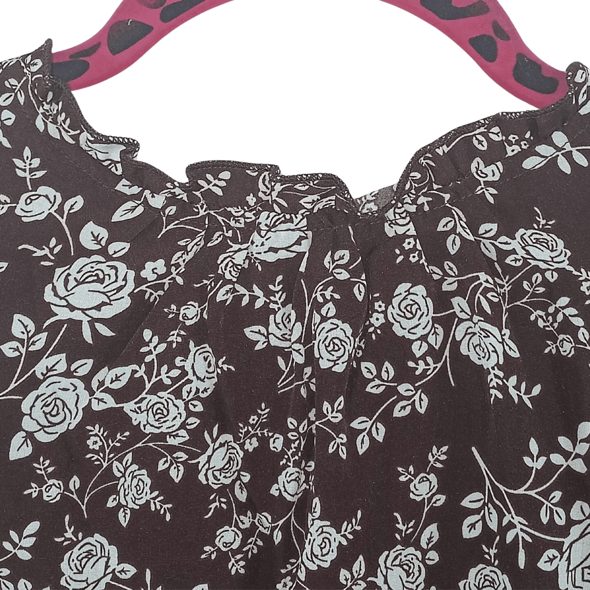 Close-up of a floral patterned fabric with a dark background
