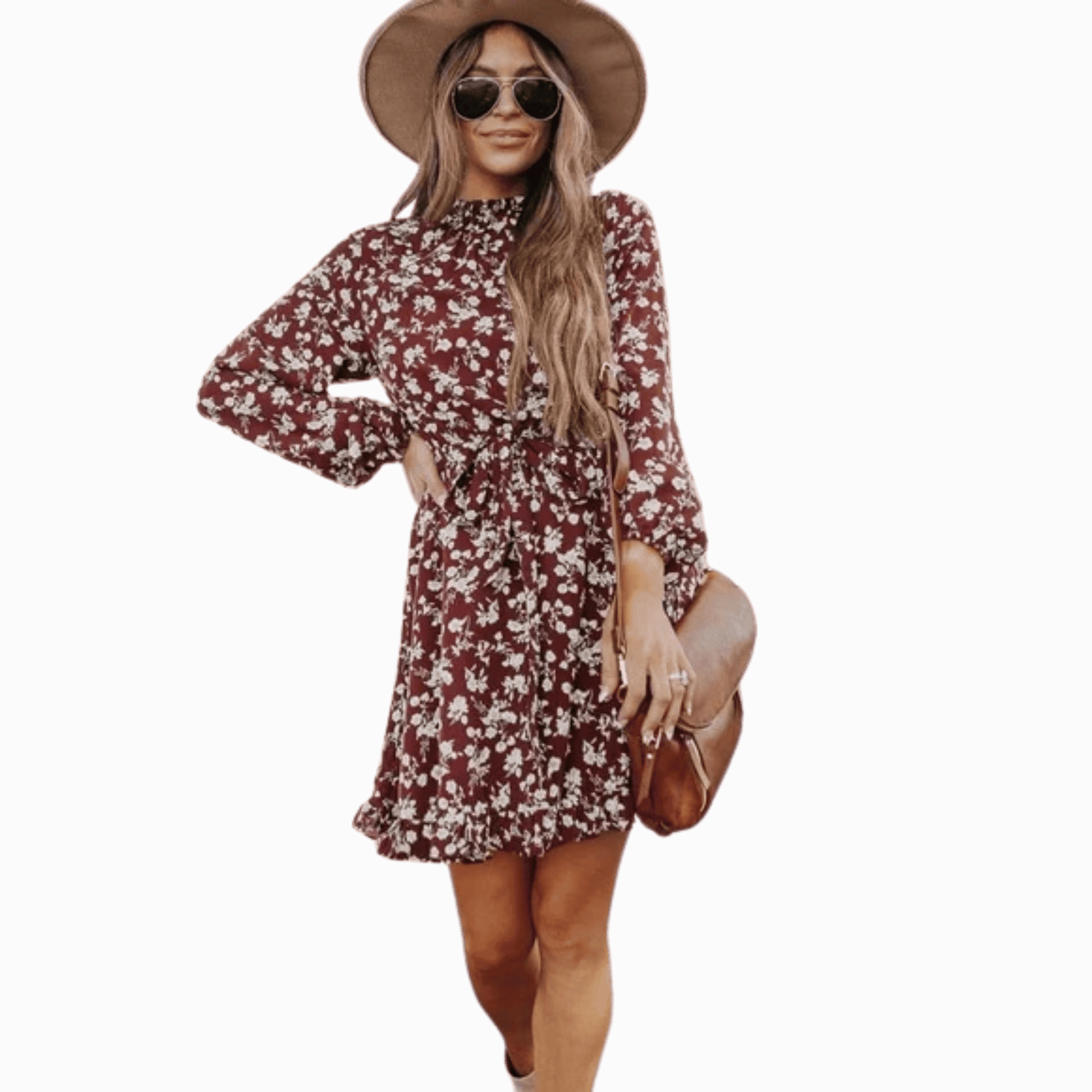 Woman wearing a floral dress and hat on a solid background