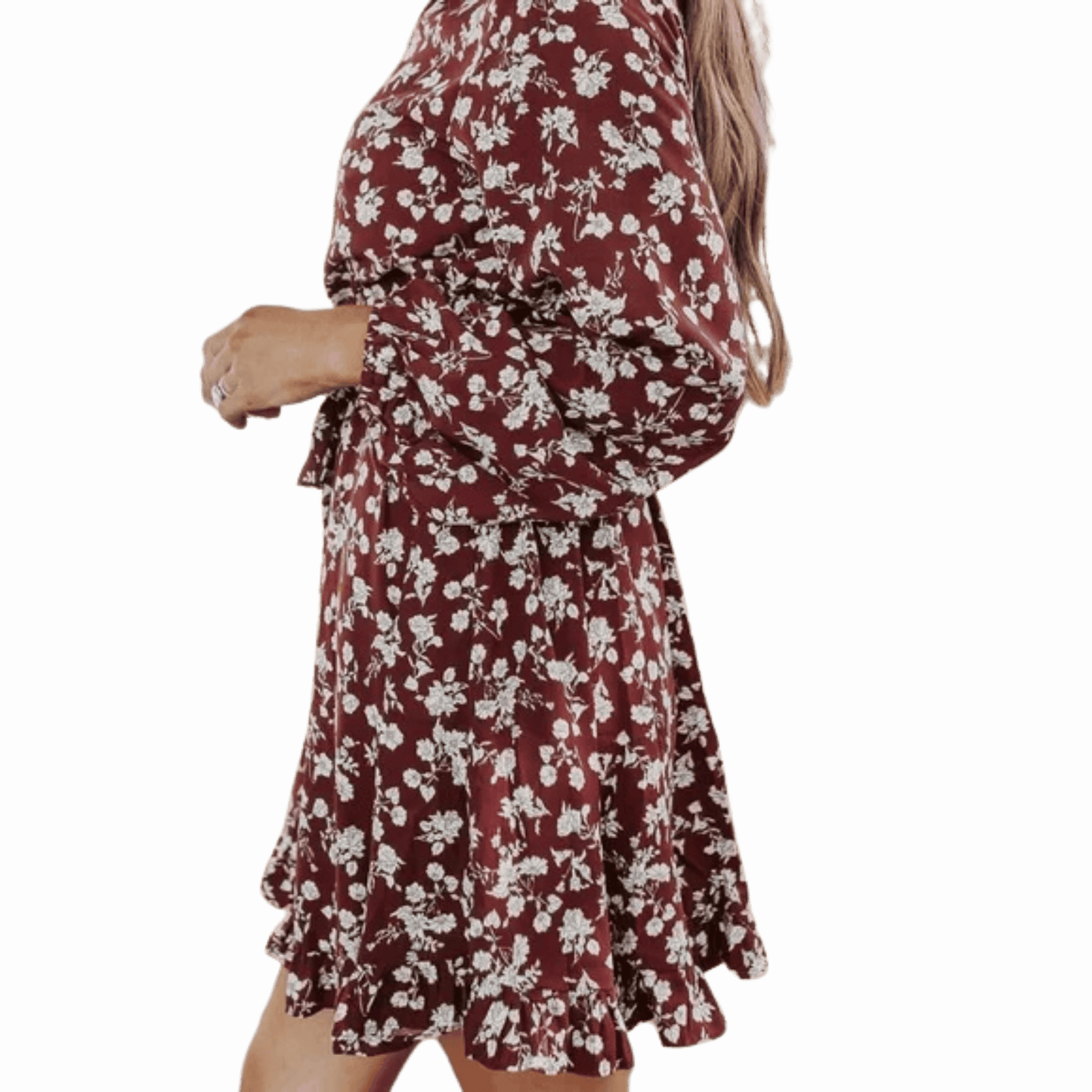 Woman wearing a floral dress on a red background
