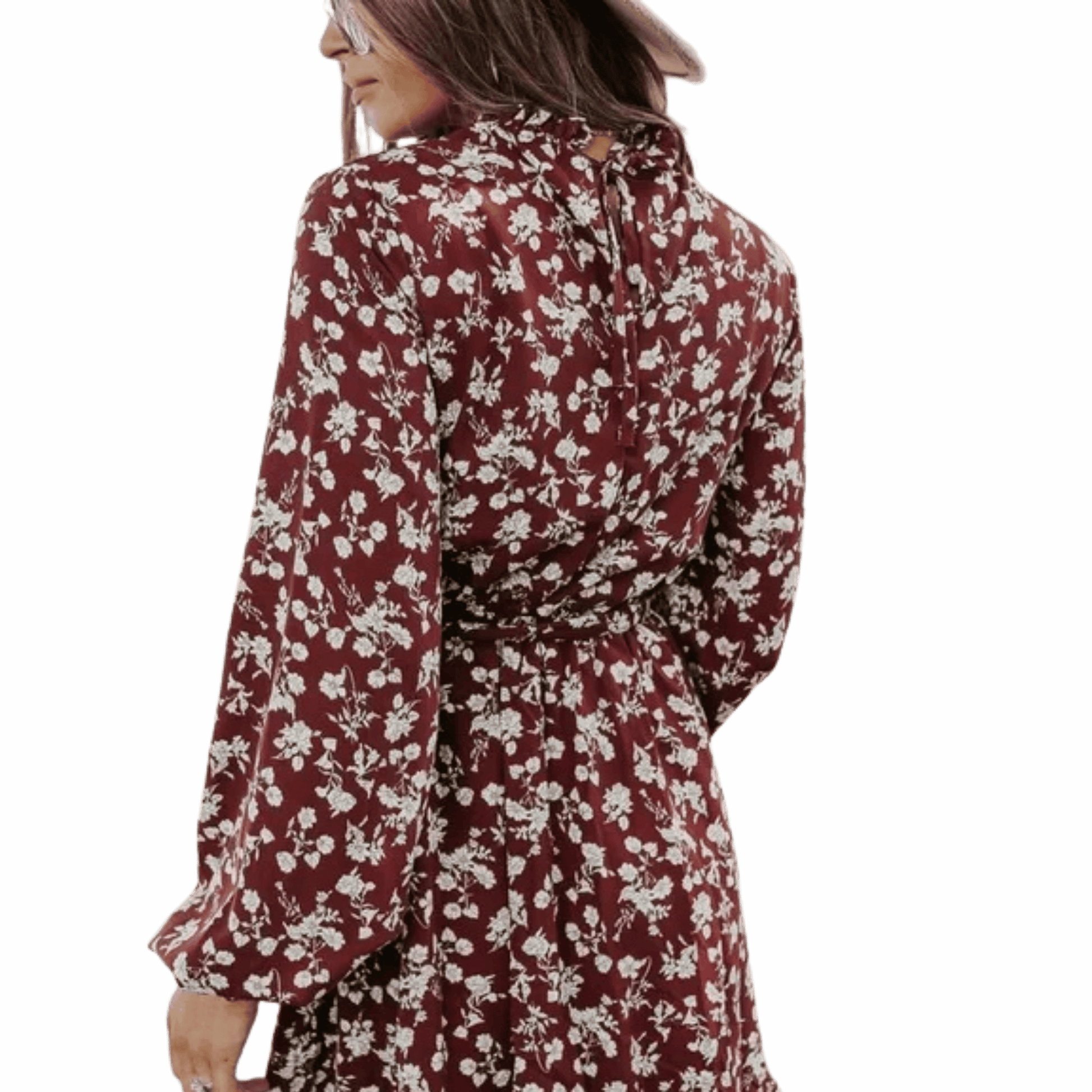 Person wearing a floral dress on a blue background