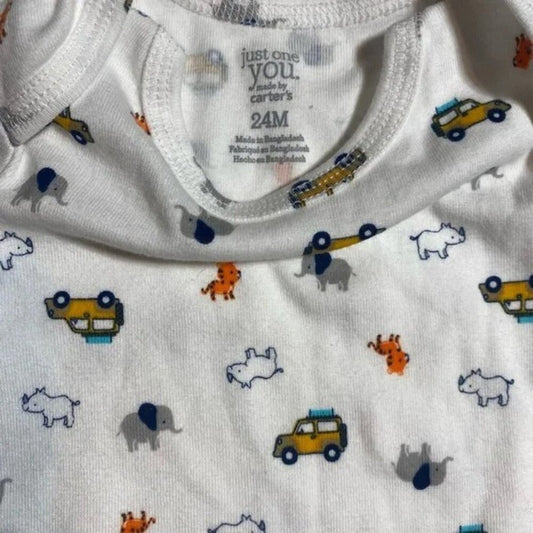 Baby onesie with animal and vehicle pattern, Carter's label visible