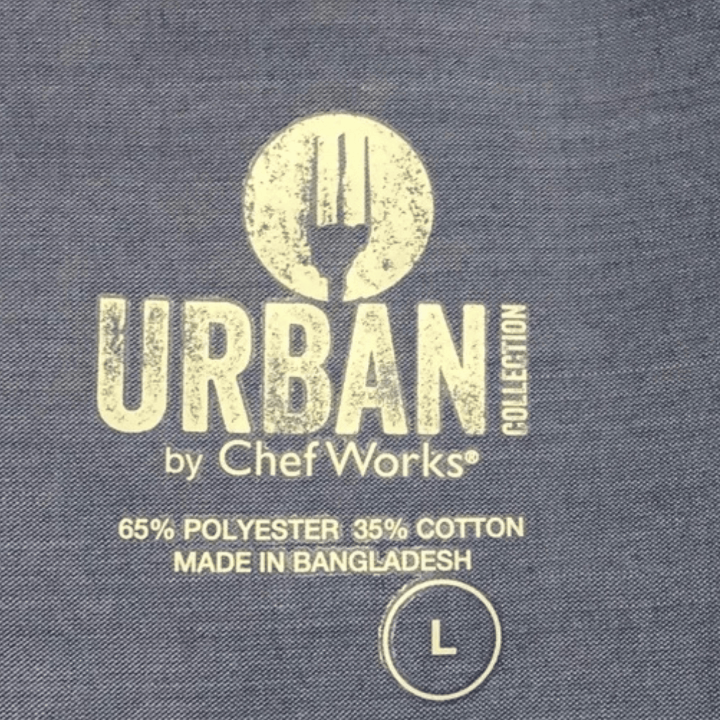 Text on fabric indicating 'Urban by Chef Works' with material and origin details.