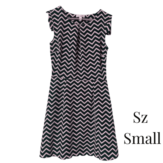 Black and white zigzag patterned dress on a transparent background with 'Sz Small' text.