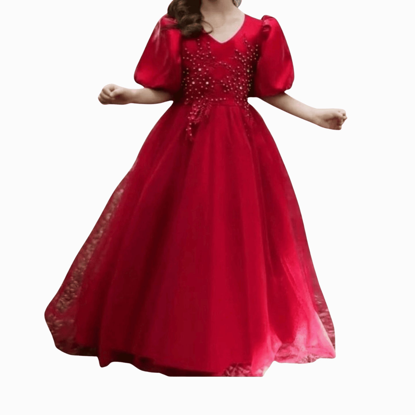 Red evening gown with beaded details on a dark background