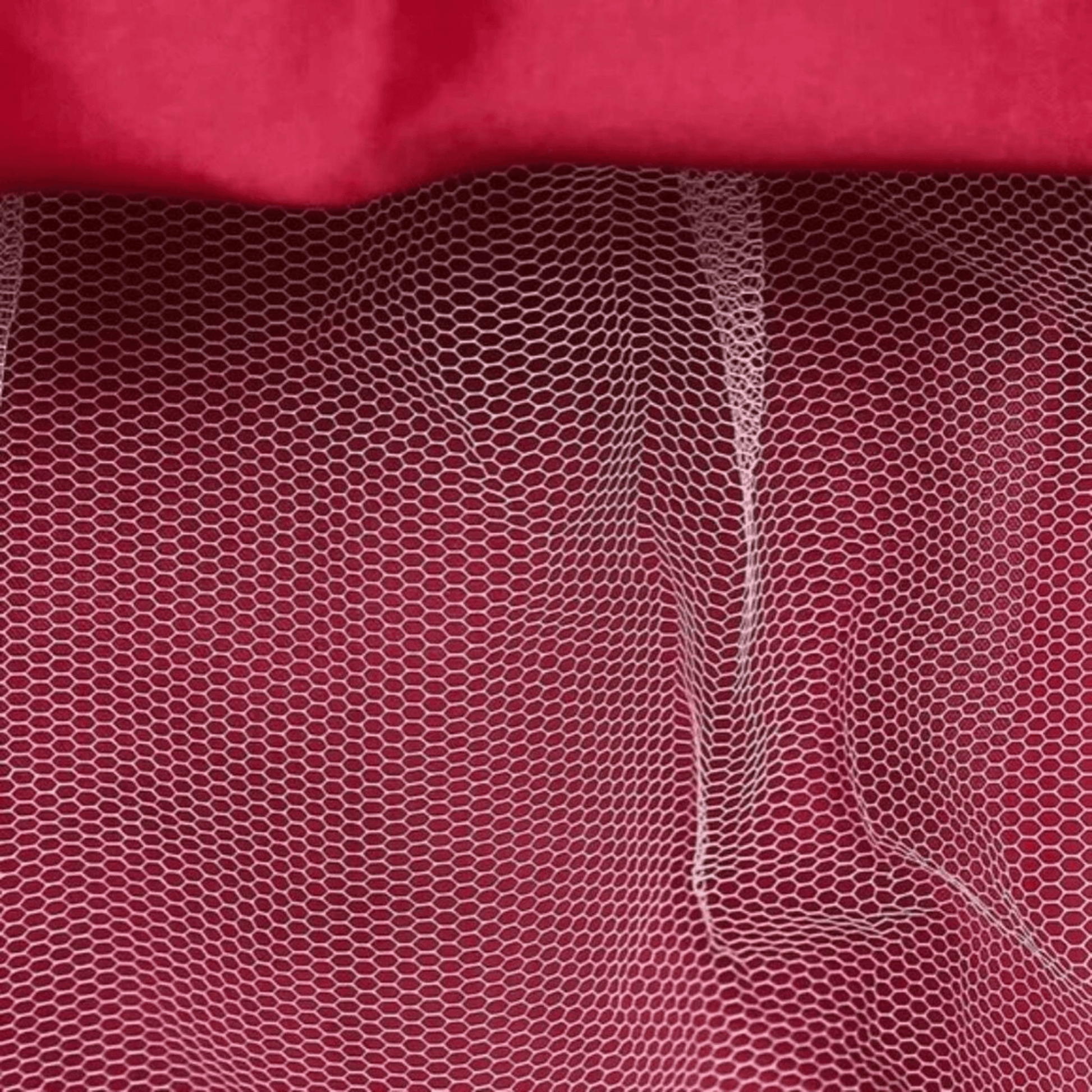 Close-up of red fabric with a textured pattern