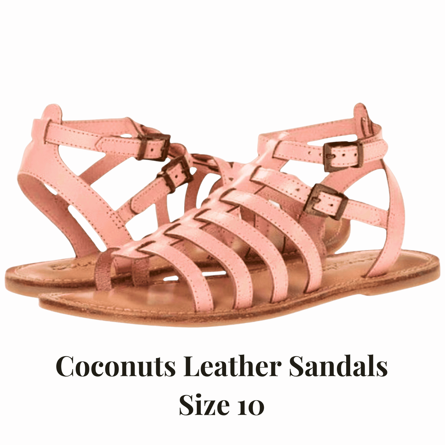 Pink leather sandals with buckles on a red background