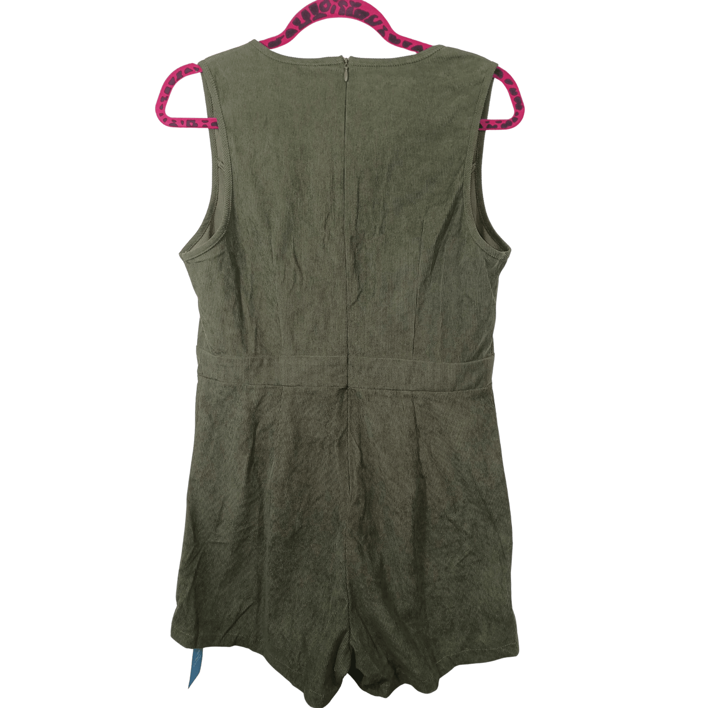 Green romper on a hanger with pink trim against a white background