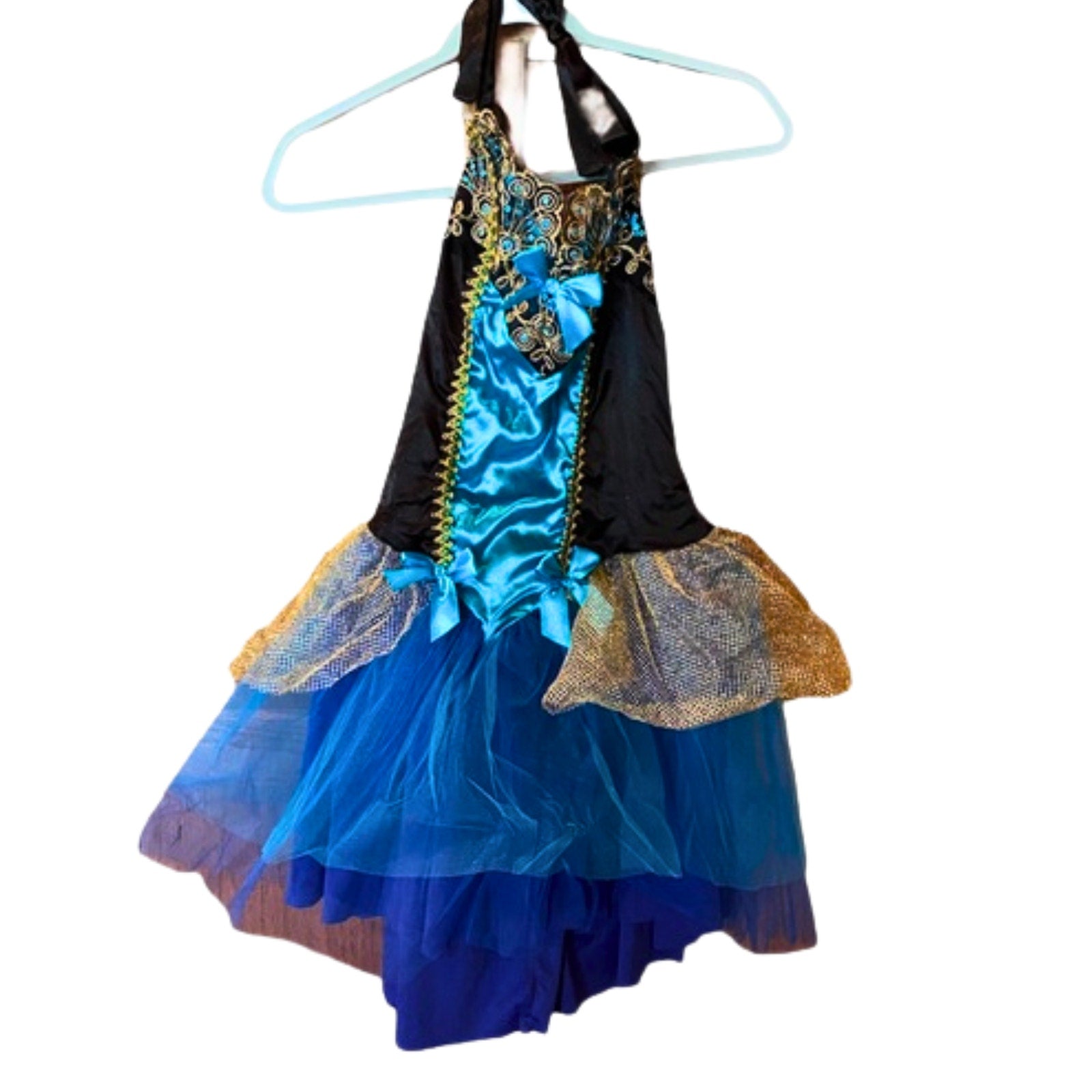 Colorful dress with blue and black patterns on a white background