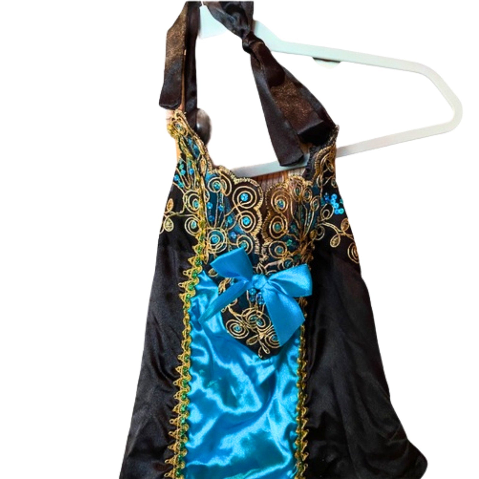 Decorative dress with blue and gold accents on a white background