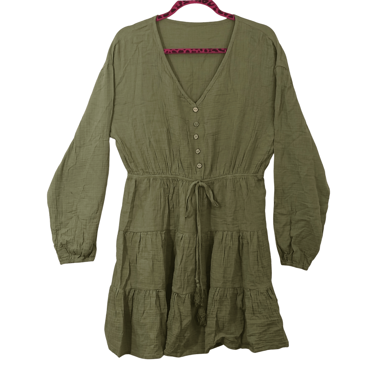 Green dress on a hanger with a transparent background