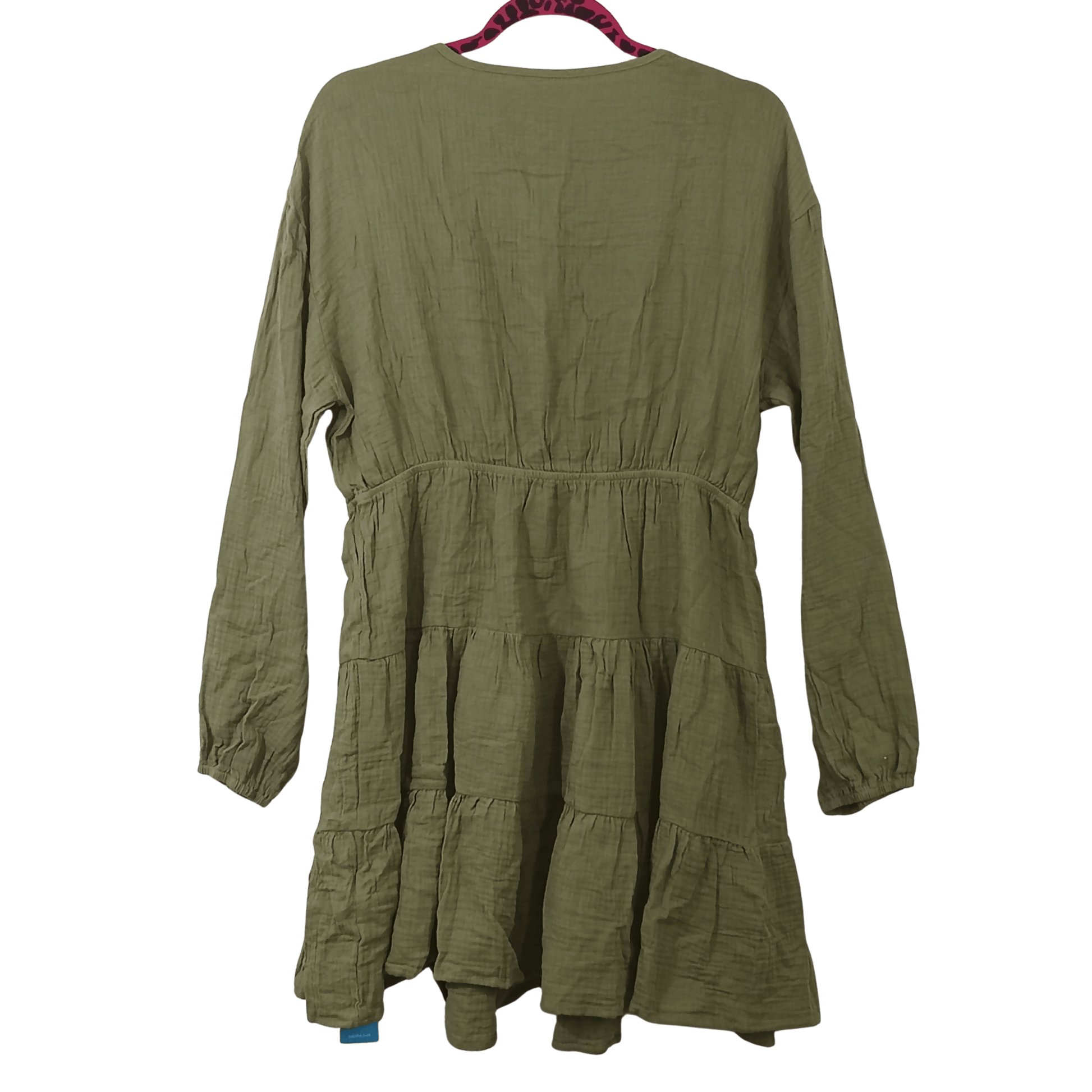 Green dress on a hanger with a transparent background