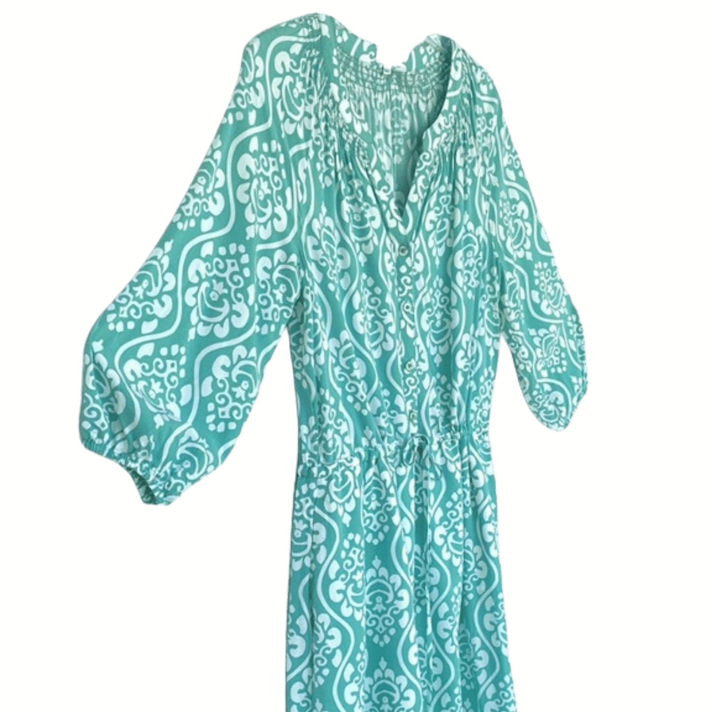 Teal patterned dress on a yellow background