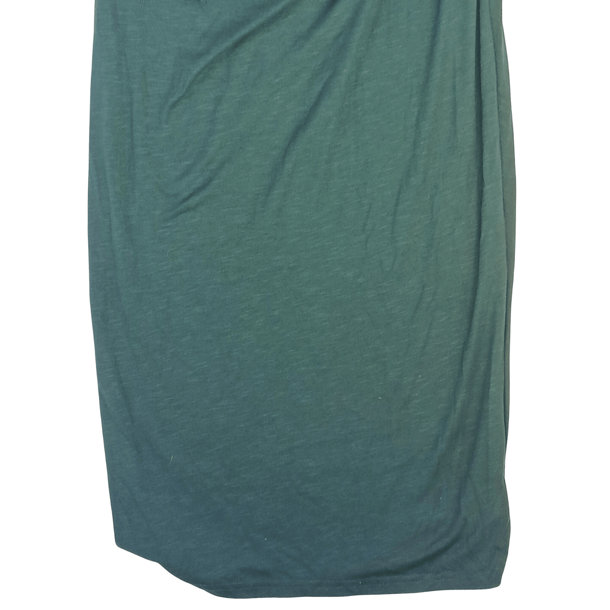 Teal fabric draped over a green background