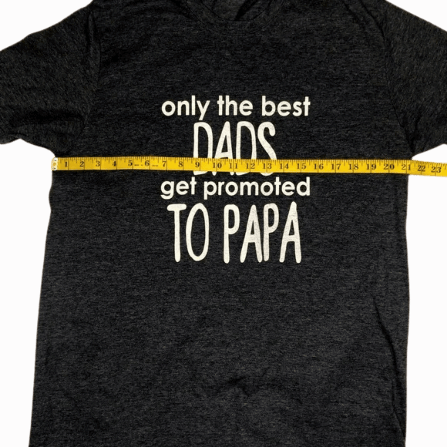 Black t-shirt with text 'only the best dads get promoted to papa' and a measuring tape graphic.