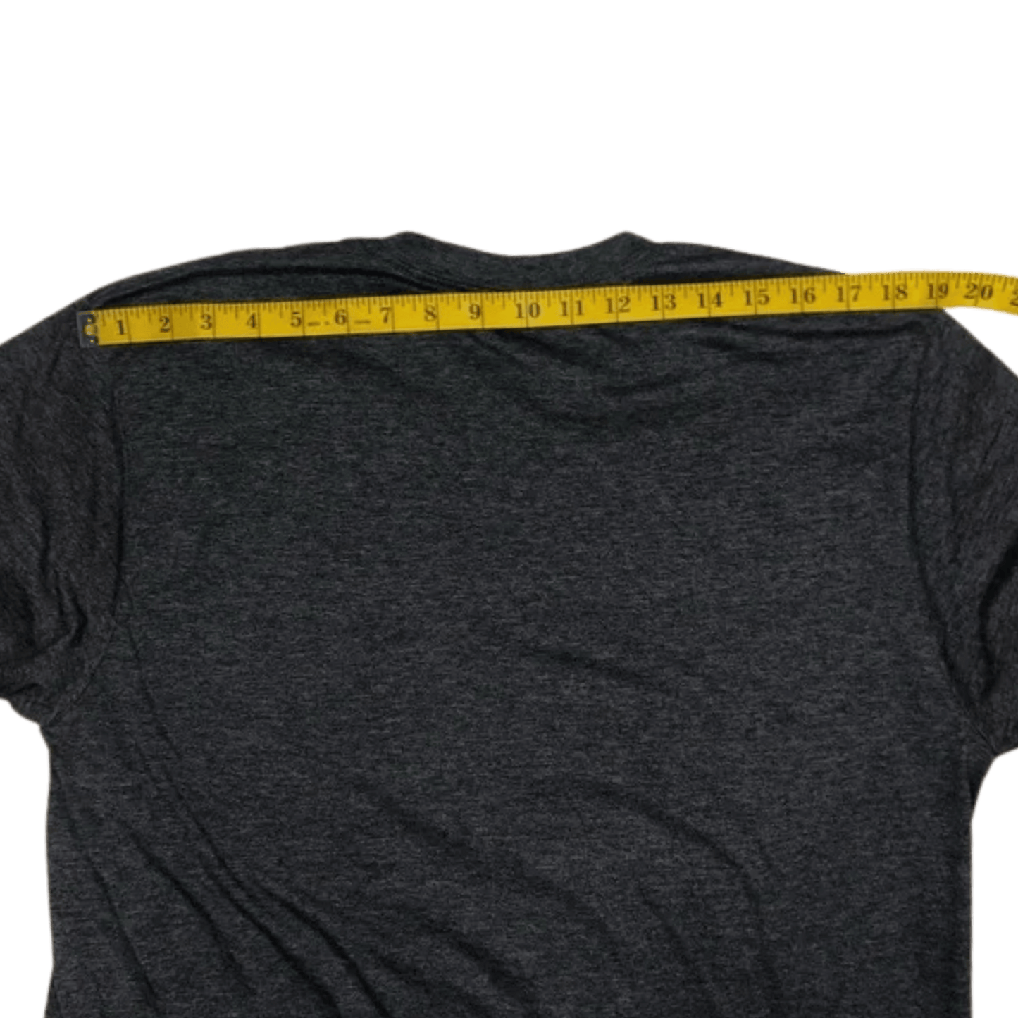 Black t-shirt with a yellow measuring tape across the chest on a transparent background