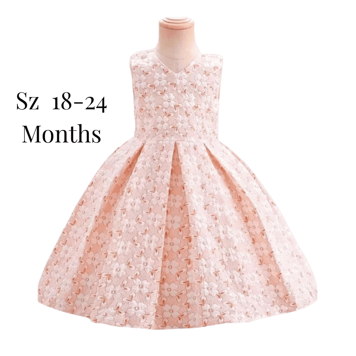 Children's dress on a mannequin with size label 'Sz 18-24 Months' on a green background