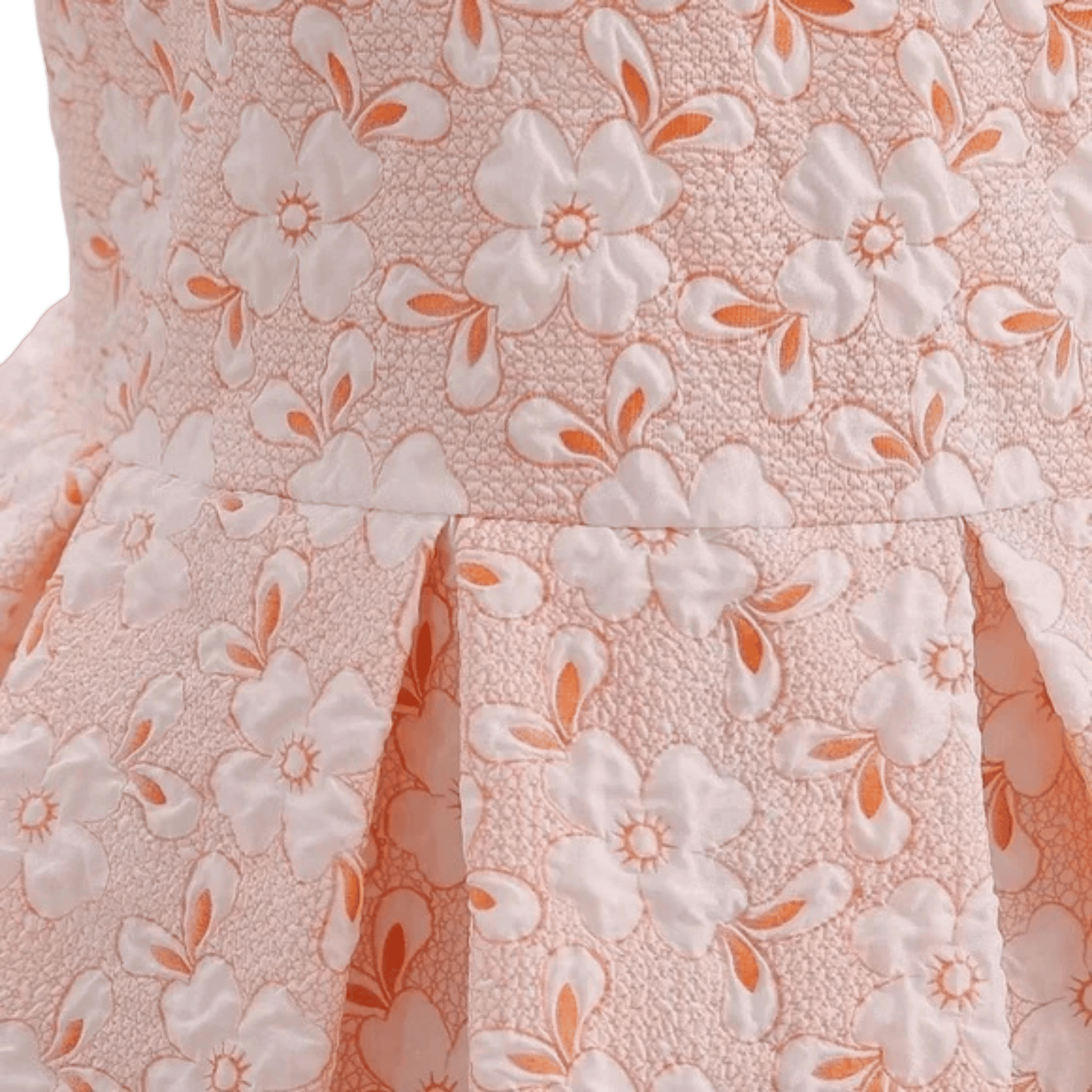 Close-up of a pink fabric with white floral patterns