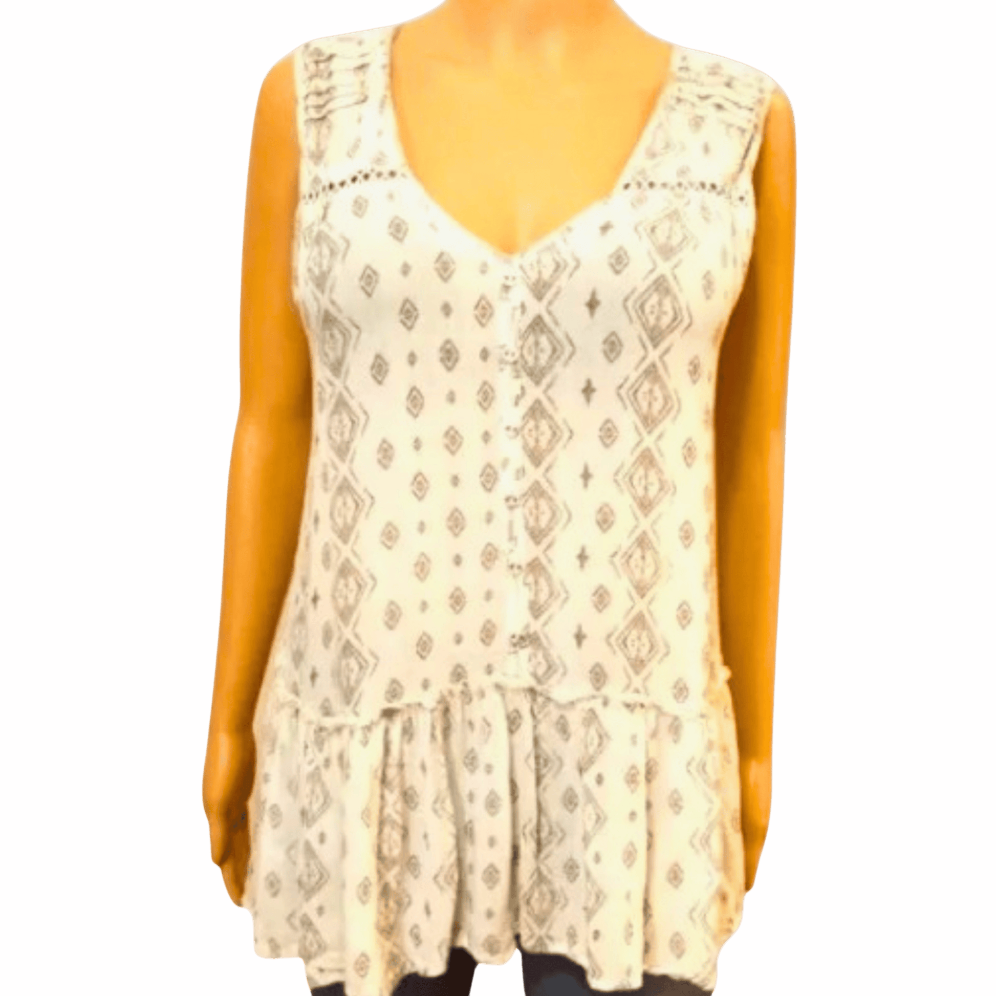 White lace dress on a mannequin against a pink background