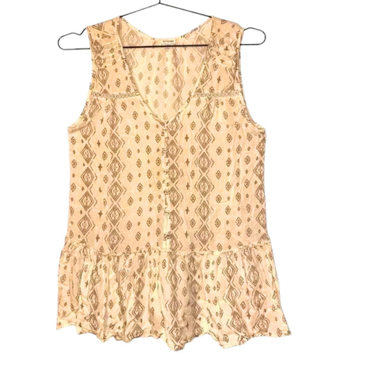 Beige sleeveless top with pattern on a hanger against a white background