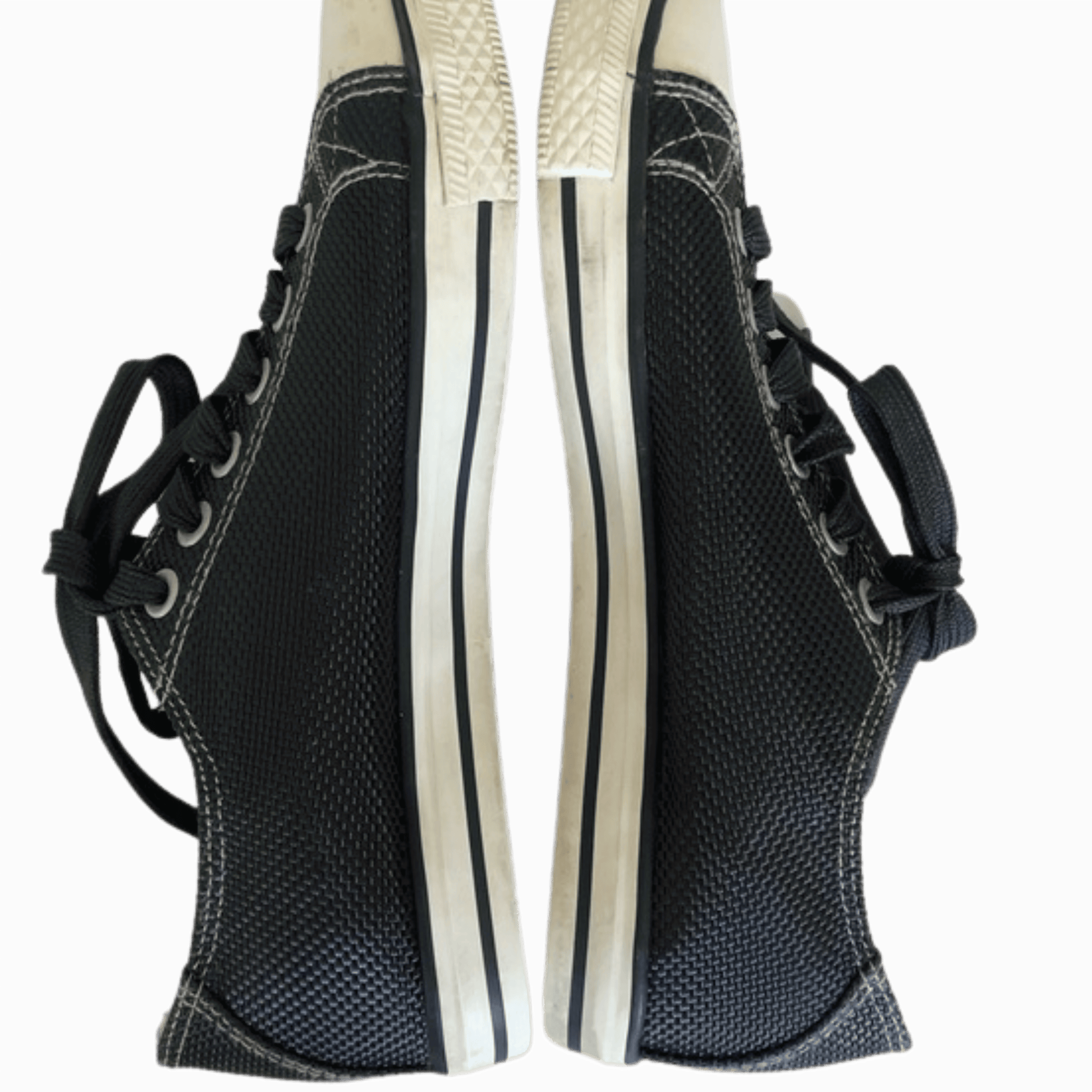 Black and white shoe with laces on a transparent background