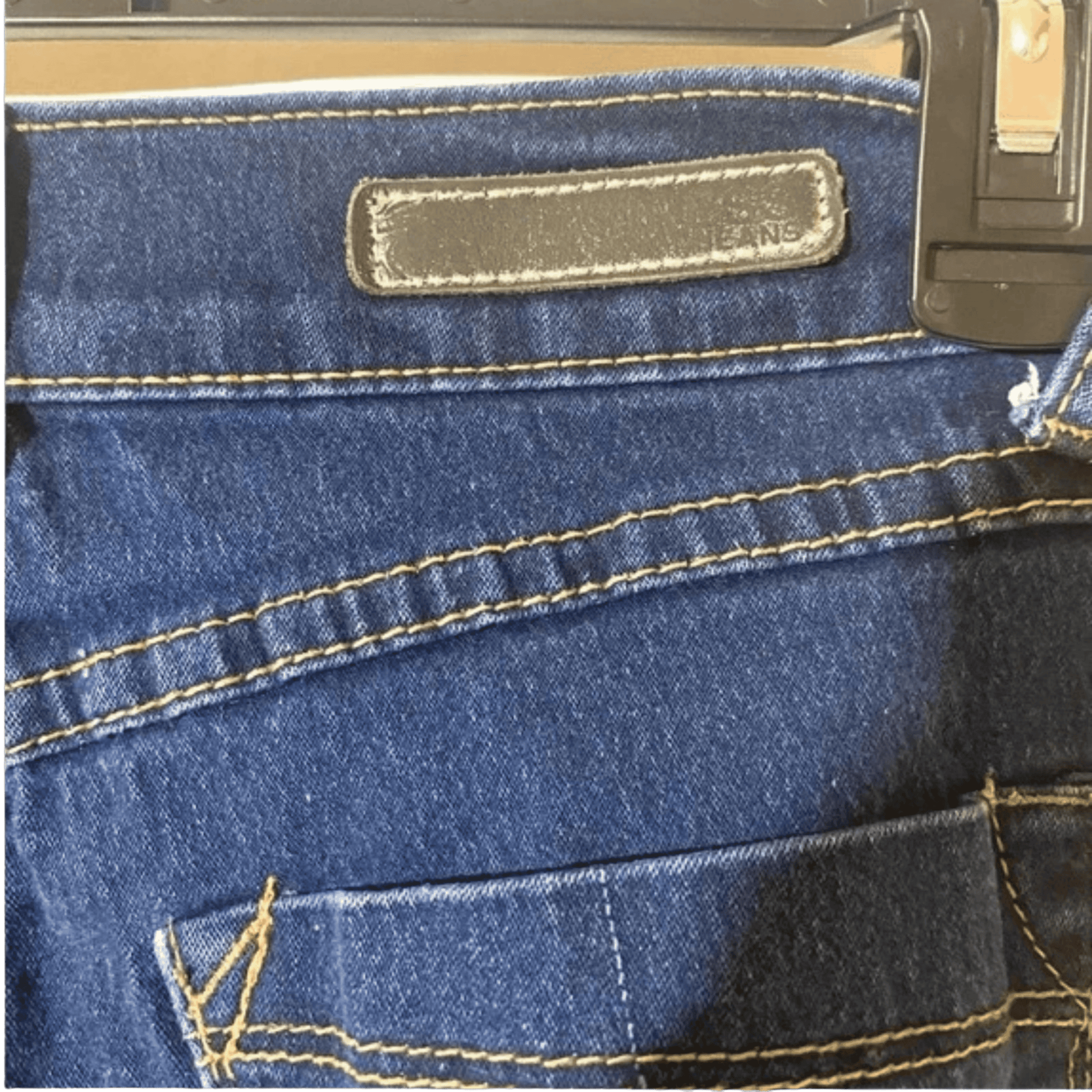 Close-up of blue jeans with Levi's label