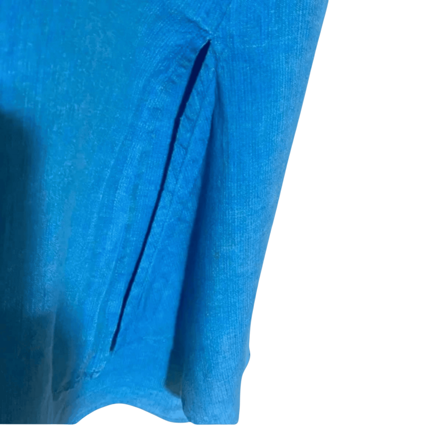 Close-up of a blue fabric texture on a plain background