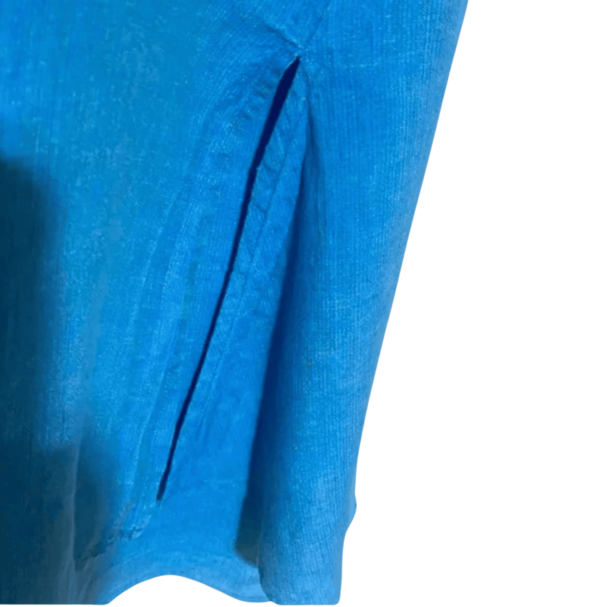 Close-up of a blue fabric texture on a plain background
